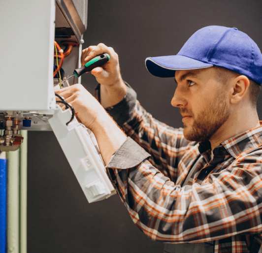 Man adjusting house heating system Man adjusting house heating system